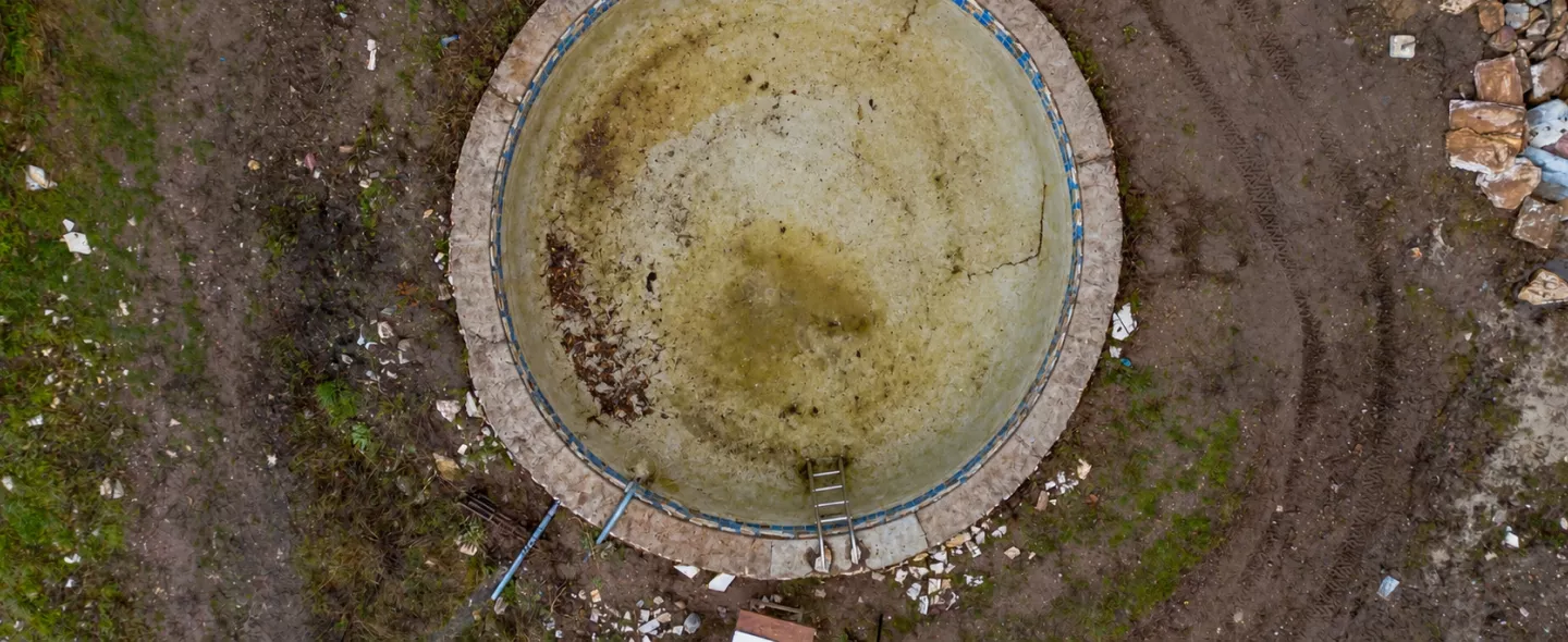 Bare South Florida backyard before Sapphire Pools inground pool construction begins