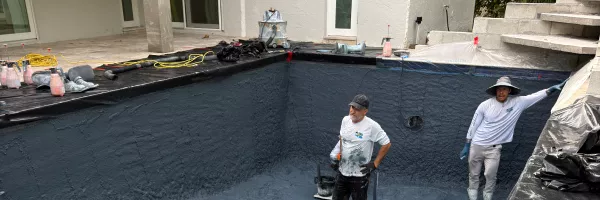 Existing Florida pool being remodeled with new tile, coping, and interior finish