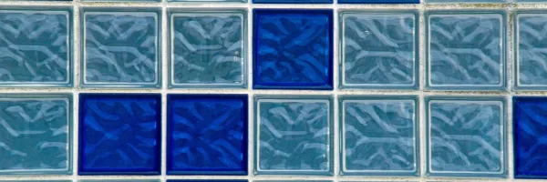 Glass bead pool finish sparkling with light reflections along the waterline