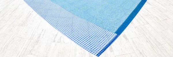 Smooth new interior finish in a resurfaced concrete swimming pool