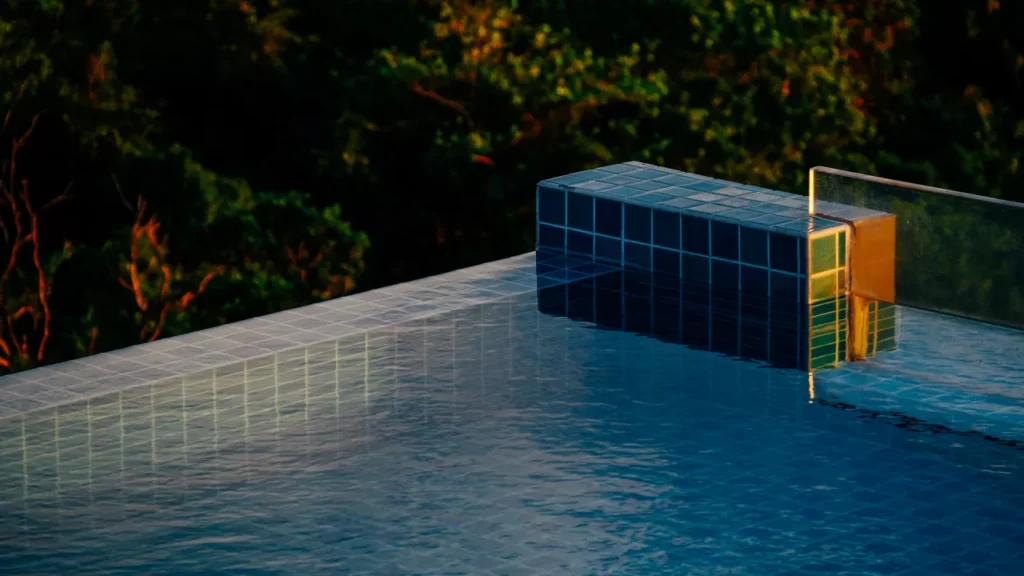 Infinity edge pool spilling into a lower catch basin